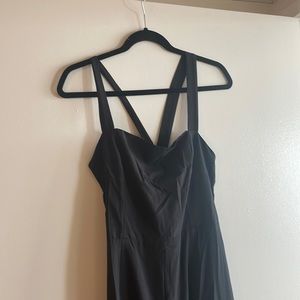 Black wide leg jumpsuit with cross cross design in the back